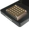 Mounting plate contains a matrix of threaded holes for grip and fixture mounting.