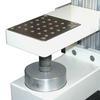 Mounting plate contains a matrix of threaded holes for grip and fixture mounting.