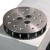 Rotating mounting plate contains a matrix of threaded holes for grip and fixture mounting.