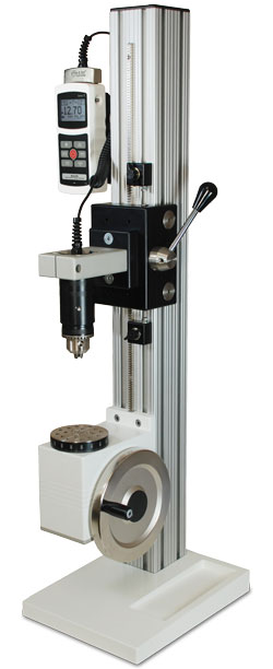 The TST vertical manual torque test stand is shown with a 5i force/torque indicator and Series R50 torque sensor.