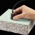 PosiTector 200 Coating Thickness Gauge in use on masonry substrates