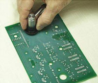 Ultrasonic thickness measurement of conformal coatings thickness