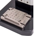 The mounting plate may be repositioned in the X- and Y-directions, for proper sample alignment. Matrix of threaded holes for fixture mounting. 