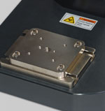 Optional AC1054 mounting plate features three center hole sizes - #10-32, 5/16-18, and 1/2-20. An array of four 1/4-28 holes is also provided.